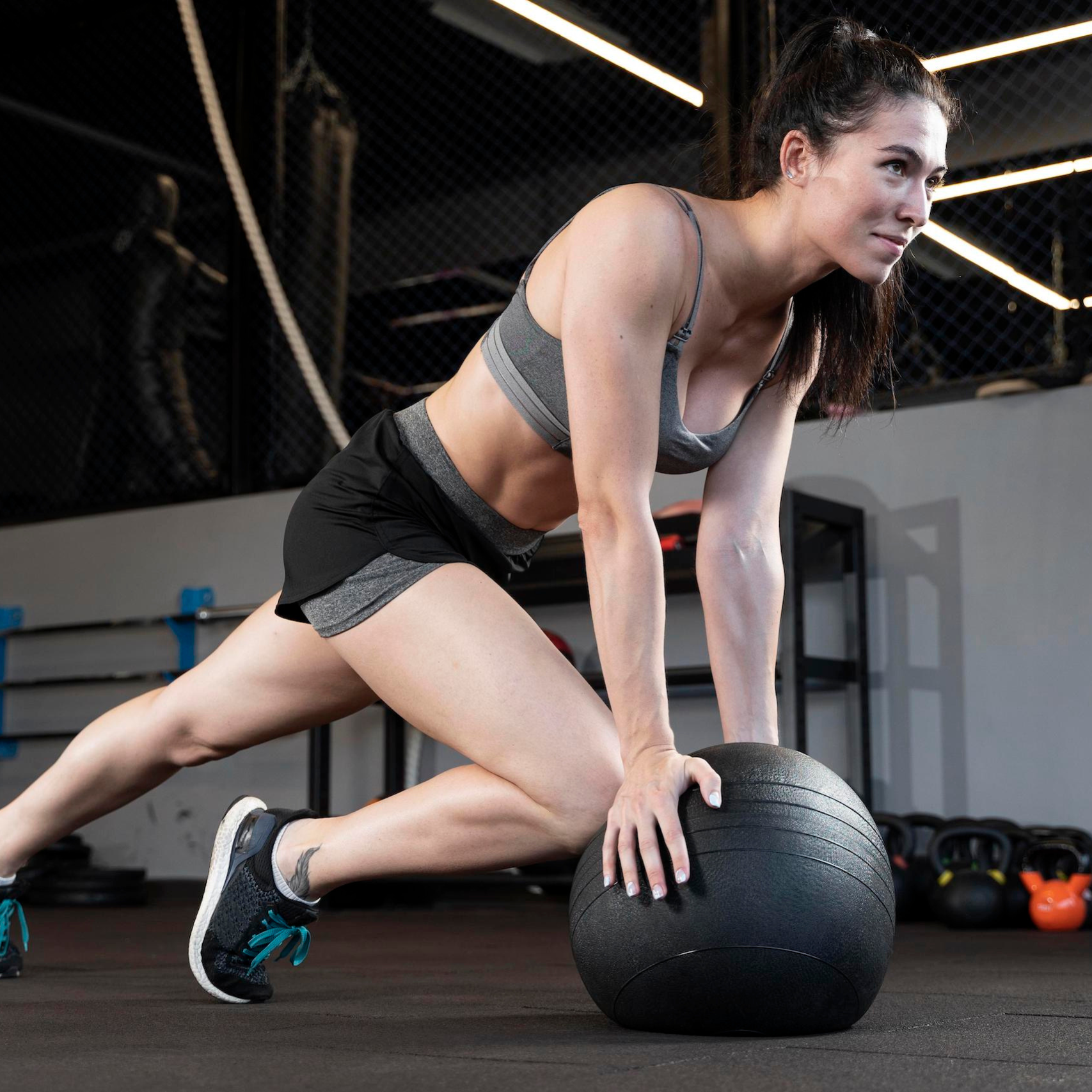 Woman working out with medicine ball